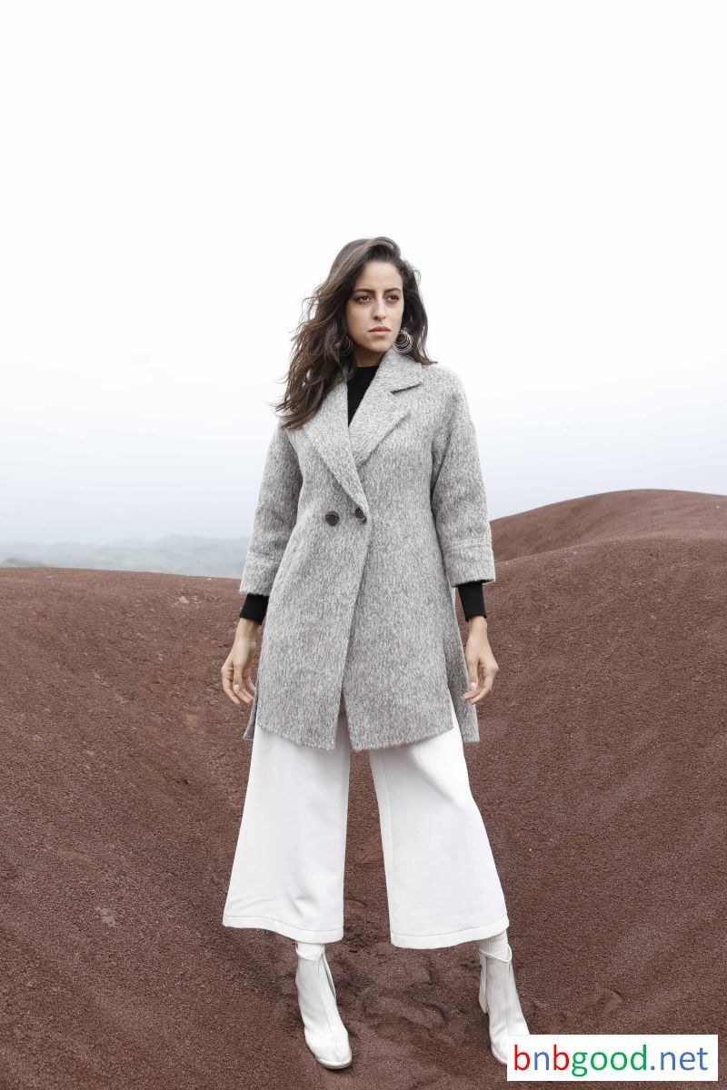 Lady's half coat, half length sleeves plus waist design