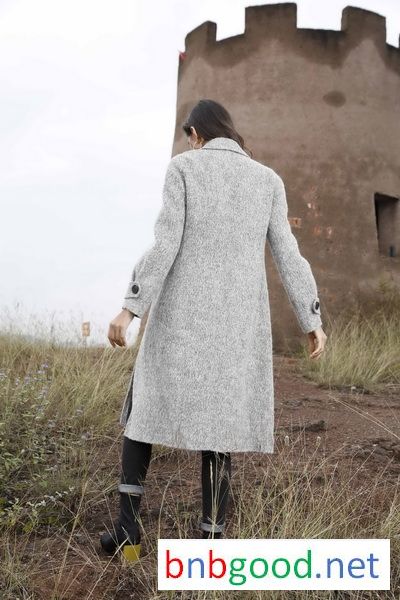 Grey black button, lady's coat.