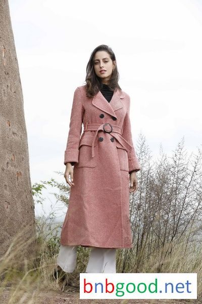Black buckled waist pink lady's overcoat