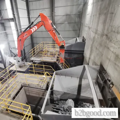 One YZH Fixed Hydraulic Crushing Mechanical Arm Simultaneously Clearing Large Rocks Blocking Feed Openings and Hoppers of Two Jaw Crushers