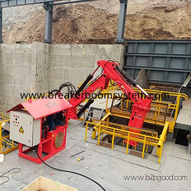 Fixed grizzly rockbreaker boom system